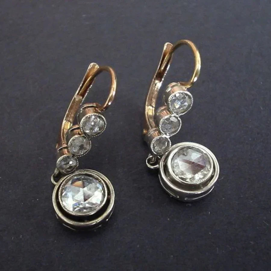 Sleek Zirconia Golden Earrings