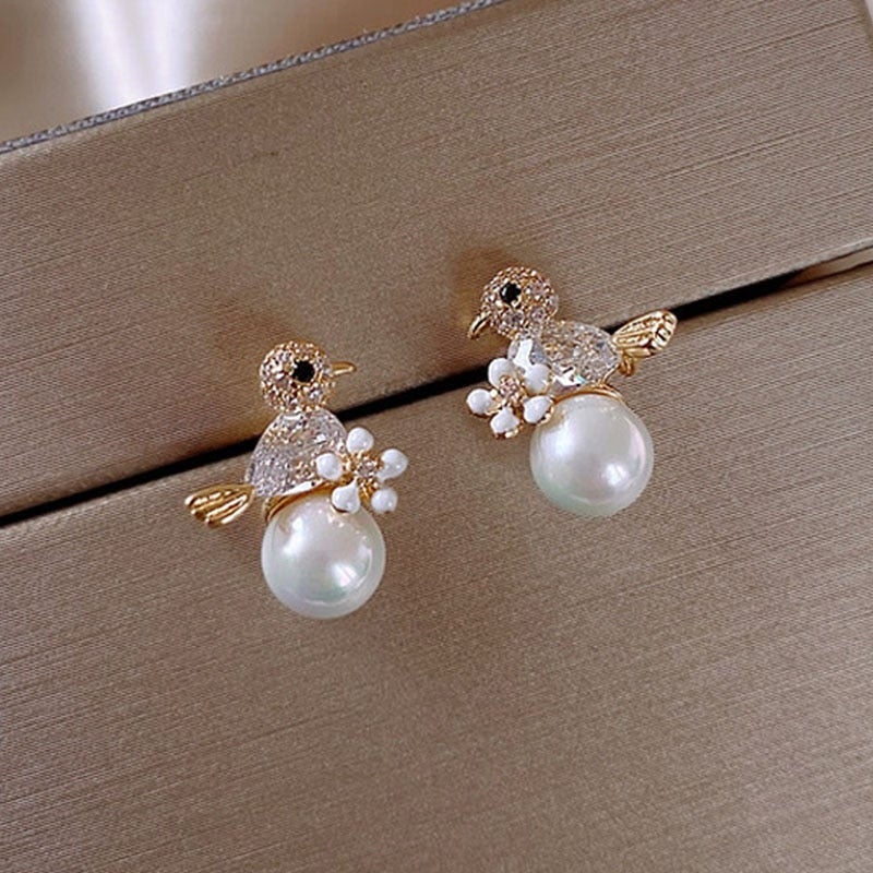 Stylish Birdie Earrings in Cubic Zirconia and Pearl Inlay